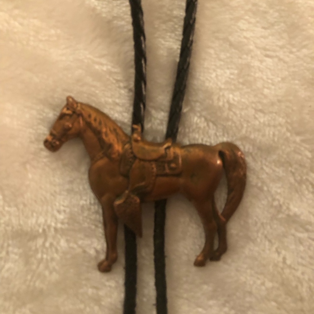 Copper Horse Bolo Tie with Black Leather Cord